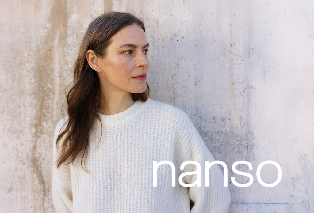 Nanson malli villapaidassa ja logo